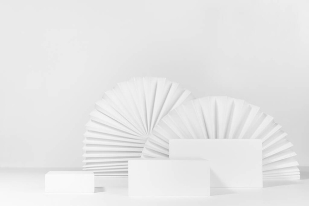 Fashion minimal modern asian style scene with set of three different size rectangle podiums mockup as showcase for displaying, presentation cosmetic product, goods with ribbed paper fans as decor. - Φωτογραφία, εικόνα