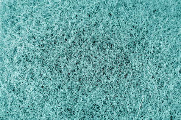 Cleaning sponge texture in cyan tone. Abstract background and texture. - Foto, immagini
