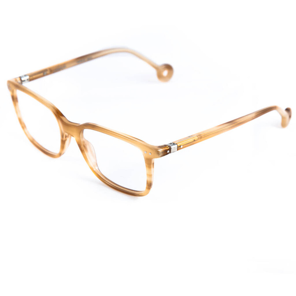eyeglass frames on a white background. Stylish framed glasses on a white background. - Фото, зображення