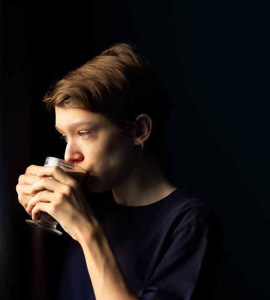 teenager at the window, pensive - Photo, Image