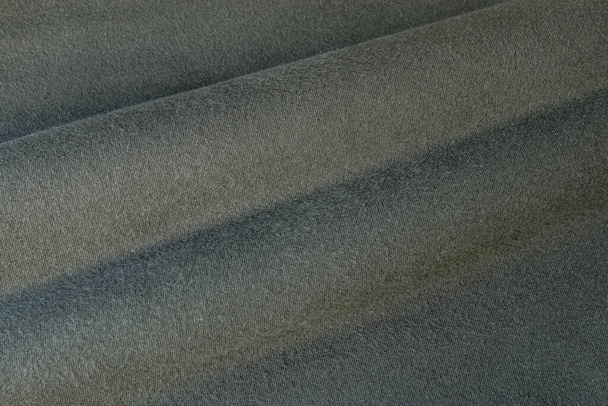 Camisola verde escuro algodão rodapé tecido de malha textura com suaves dobras swatch - Foto, Imagem