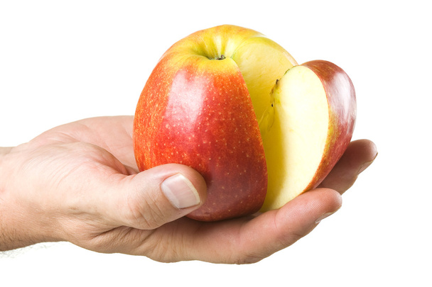 Sliced ??apple in the hands - Foto, Imagen