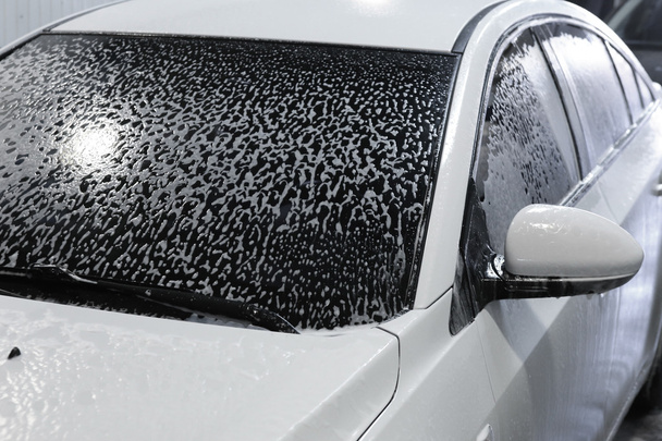 car covered with foam - Φωτογραφία, εικόνα
