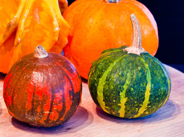 Pumpkins for Halloween with funny friends who play with ghosts - - Photo, Image