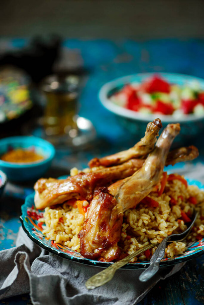 Rabbit pilaf on ceramic plate.style rustic.selective focus - Photo, Image
