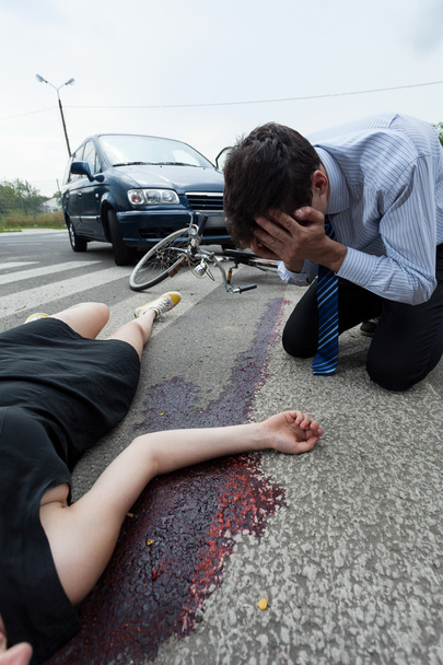 Bleeding woman on the pedestrian crossing - Zdjęcie, obraz