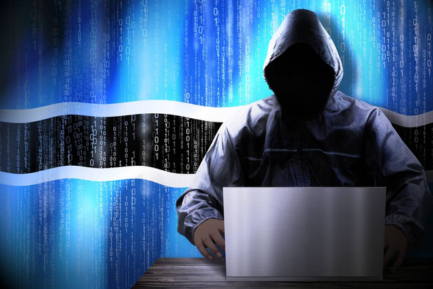 匿名のフードハッカー、ボツワナの国旗、バイナリコード-サイバー攻撃の概念 - 写真・画像