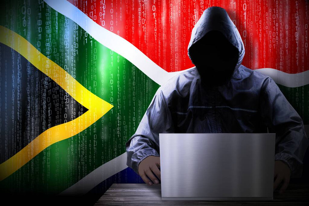 匿名のフードハッカー、南アフリカの国旗、バイナリコード-サイバー攻撃の概念 - 写真・画像