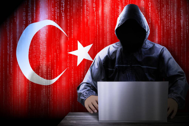 Anonymní maskovaný hacker, vlajka Turecka, binární kód - koncept kybernetického útoku - Fotografie, Obrázek