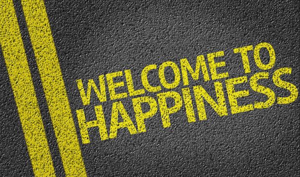 Добро пожаловать в Happiness, написанный на дороге
 - Фото, изображение
