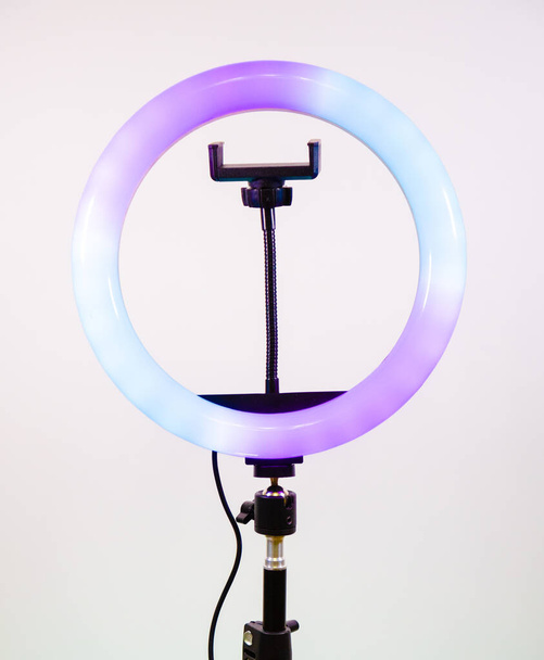 Ring lamp shines in two colors. Blue and purple. - Photo, Image
