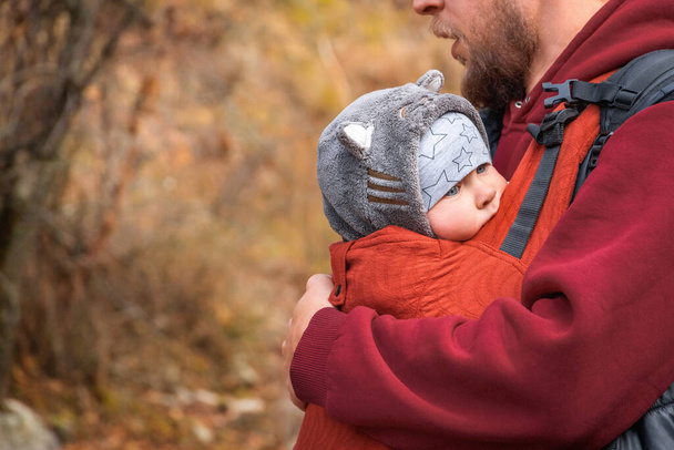 Babywearing father autumn outdoor with copy space. - Foto, Imagem
