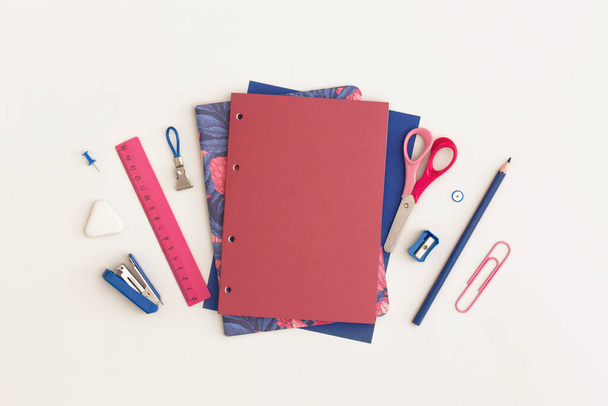 School stationery on white background. Top view with copy space. Flat lay. Back to school concept. - Photo, Image