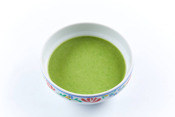 close-up view of green cream soup with broccoli - Photo, Image