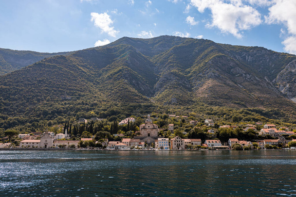 The Bay of Kotor, the Adriatic Sea in southwestern Montenegro. Its well-preserved group of medieval towns of Kotor, Tivat, Perast and Herceg Novi.  Travelling and leasure concept, beautiful seascape - Fotoğraf, Görsel