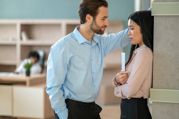 Boss forcing his assistant to have sexual relations with him - Photo, image