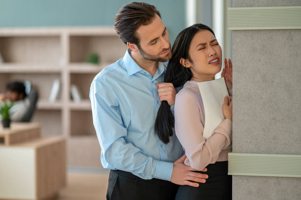 Boss forcing his assistant to have sexual relations with him - Photo, Image