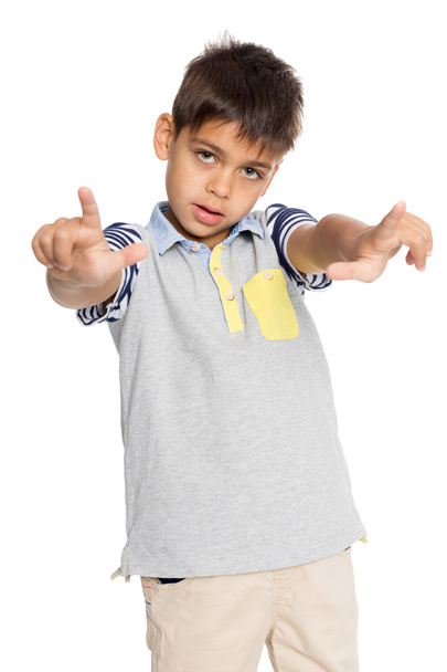 Boy pointing finger at something - Foto, afbeelding