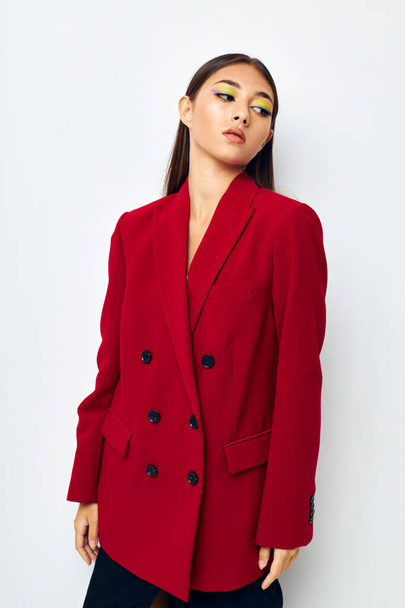 young woman fashion jacket posing isolated background unaltered - Fotó, kép