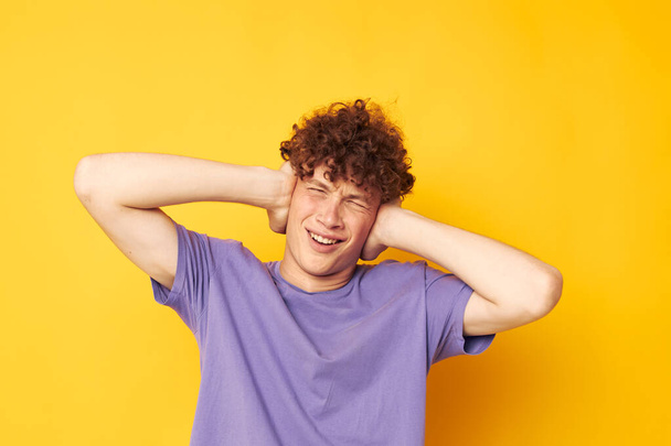 purple t-shirt youth home style emotions yellow background - 写真・画像