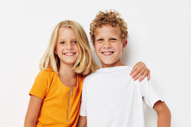 funny children hug friendship boy and girl together - Valokuva, kuva