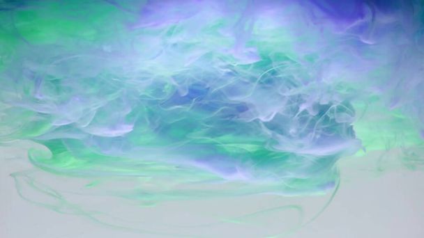Αφηρημένη θολή κηλίδα του όμορφου πράσινου και μωβ χρώματος.Πολύχρωμο γεωμετρικό σχεδιασμό φόντου - Φωτογραφία, εικόνα