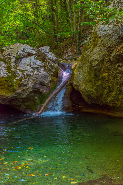 small waterfall in the mountains in summer - Φωτογραφία, εικόνα