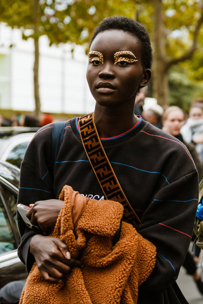 PARIS, FRANCE - SEPTEMBER 29, 2019: A model before Valentino fashion show at Paris Fashion Week Spring/Summer 2020.   - Фото, изображение