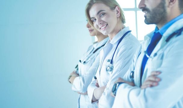 Portrait of confident doctors with arms crossed at medical office - Photo, Image