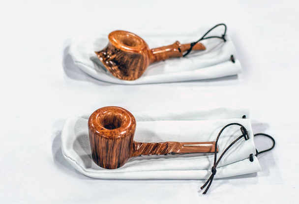 A pair of custom smoking pipes are called a poker pike and a freehand pipe. - Photo, Image