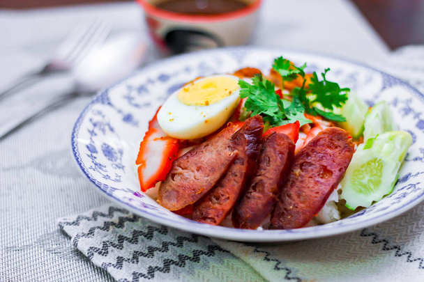 Rice with Red Roast Pork Served Boiled Egg and topped with Sweet Sauce. - Fotografie, Obrázek