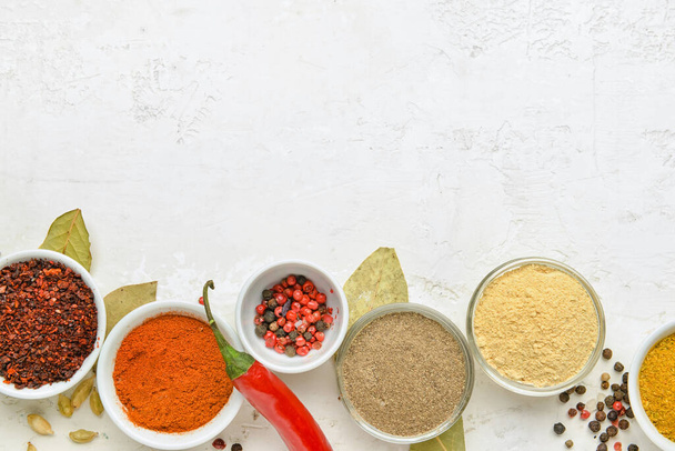 Set of different aromatic spices on light background - Foto, imagen