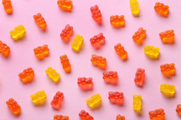 Sweet jelly bears on pink background - Фото, изображение