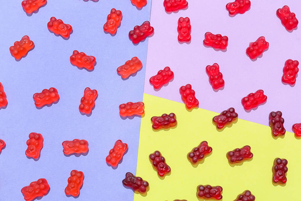 Yummy jelly bears on color background - Фото, зображення