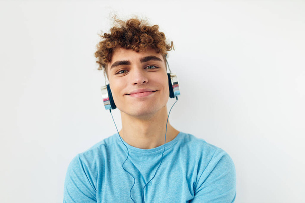 handsome young man in headphones music emotions Lifestyle unaltered - Valokuva, kuva