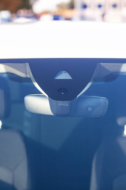 Sensors on the windshield, modern car, near the mirror. - Photo, Image