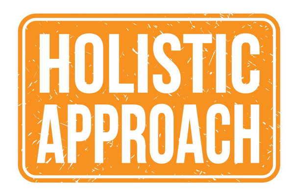 HOLISTIC APPROACH, слова, написані на знаку маркування помаранчевого прямокутника
 - Фото, зображення