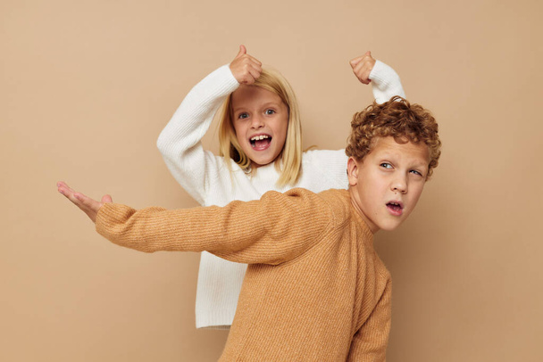 Little boy and girl hug entertainment posing friendship childhood unaltered - Фото, изображение
