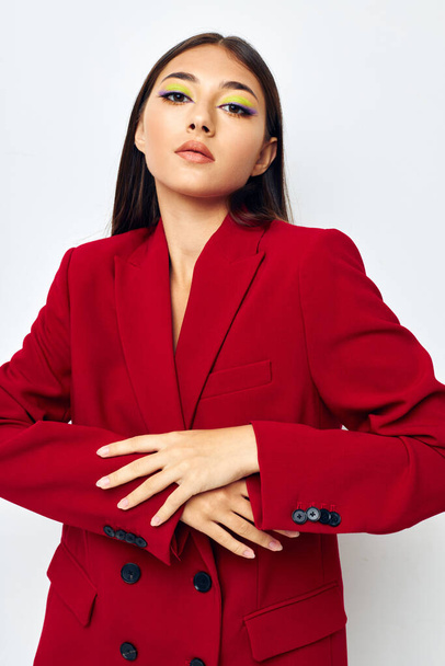 young woman fashion jacket posing isolated background unaltered - 写真・画像