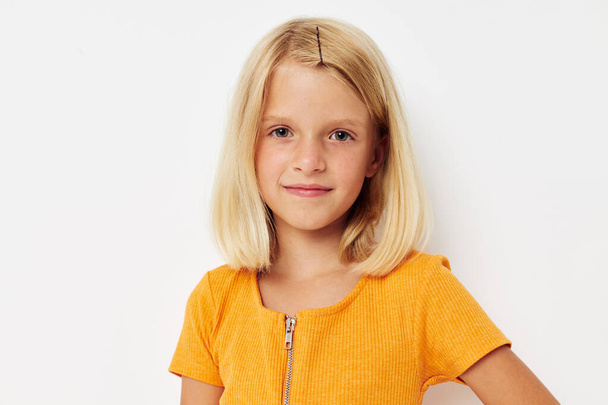 little girl with blond hair smile posing fun - Foto, Imagem