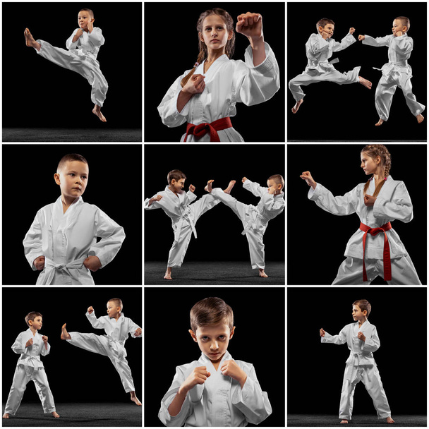 Group of young girls and boys, taekwondo athletes training together isolated over dark background. Concept of sport, education, skills - Photo, Image