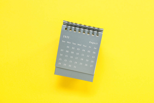 Calendar for August 2022 on yellow background - Photo, Image