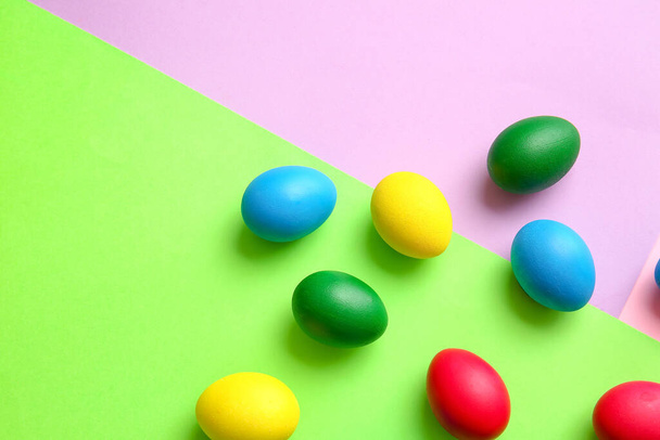 Multicolored Easter eggs on color background - Photo, Image