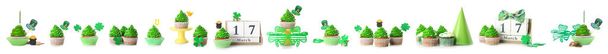 Lekkere cupcakes voor St. Patrick 's Day op witte achtergrond - Foto, afbeelding