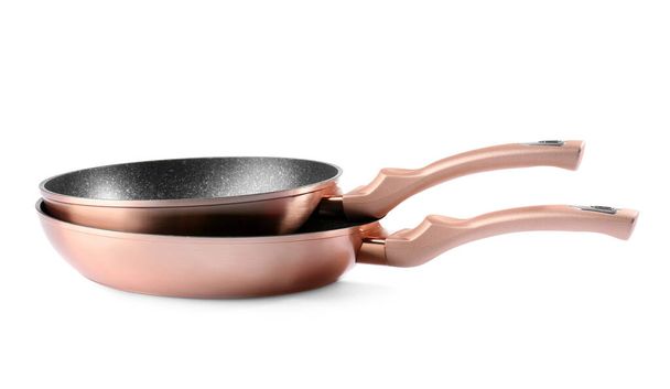 Copper frying pans on white background - Photo, Image
