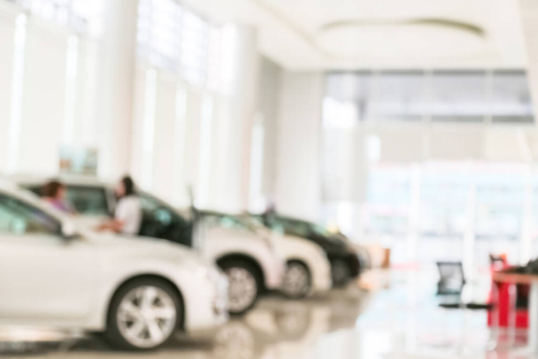 Abstract blur of car in the showroom background - Fotoğraf, Görsel