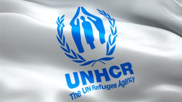 logo van de Verenigde Naties voor vluchtelingen. Nationaal 3d UNHCR-logo zwaaiend. Teken van vluchtelingen van de Verenigde Naties naadloze animatie. UNHCR-vlag HD-achtergrond - New York, 4 juli 2021 - Video