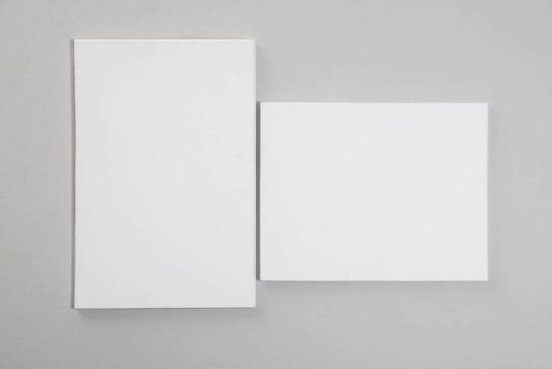 Blank canvas on grey wall. Space for design - Fotoğraf, Görsel