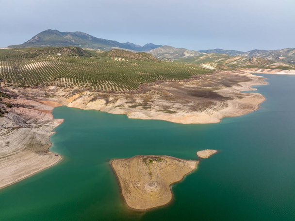 view of a water reservoir with low water levels - Φωτογραφία, εικόνα