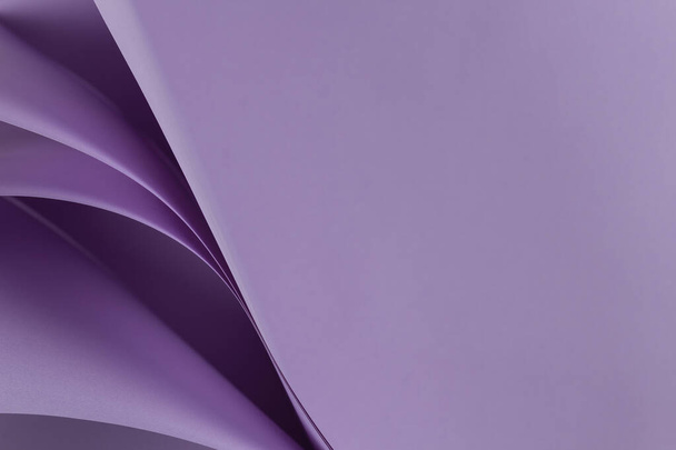 Abstract colored paper geometry composition monochrome background in purple color with curved lines and shapes - Photo, Image